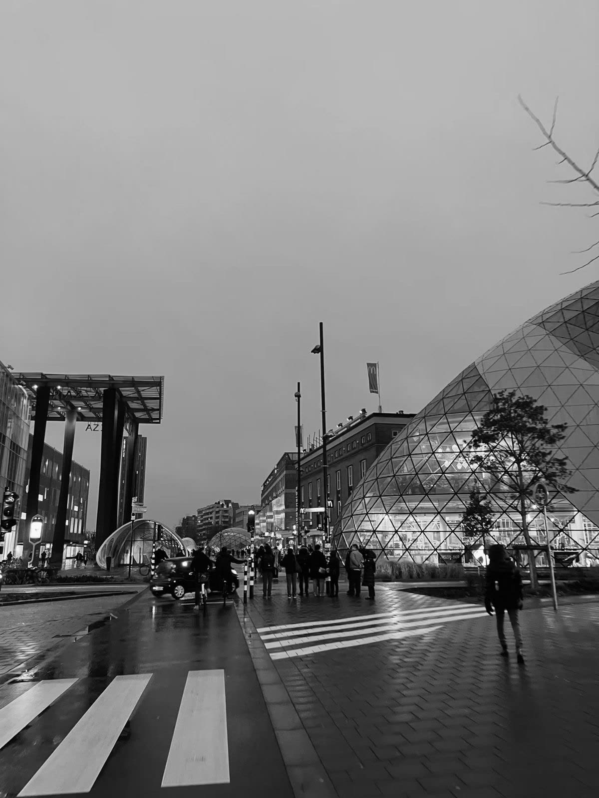 Eindhoven city square at dusk in black and white